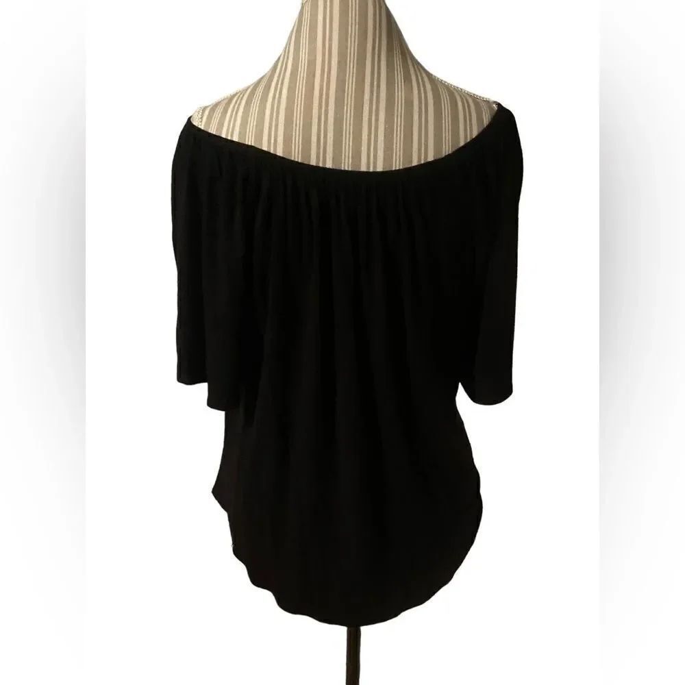Chicos size large black top excellent like new condition great wardrobe addition